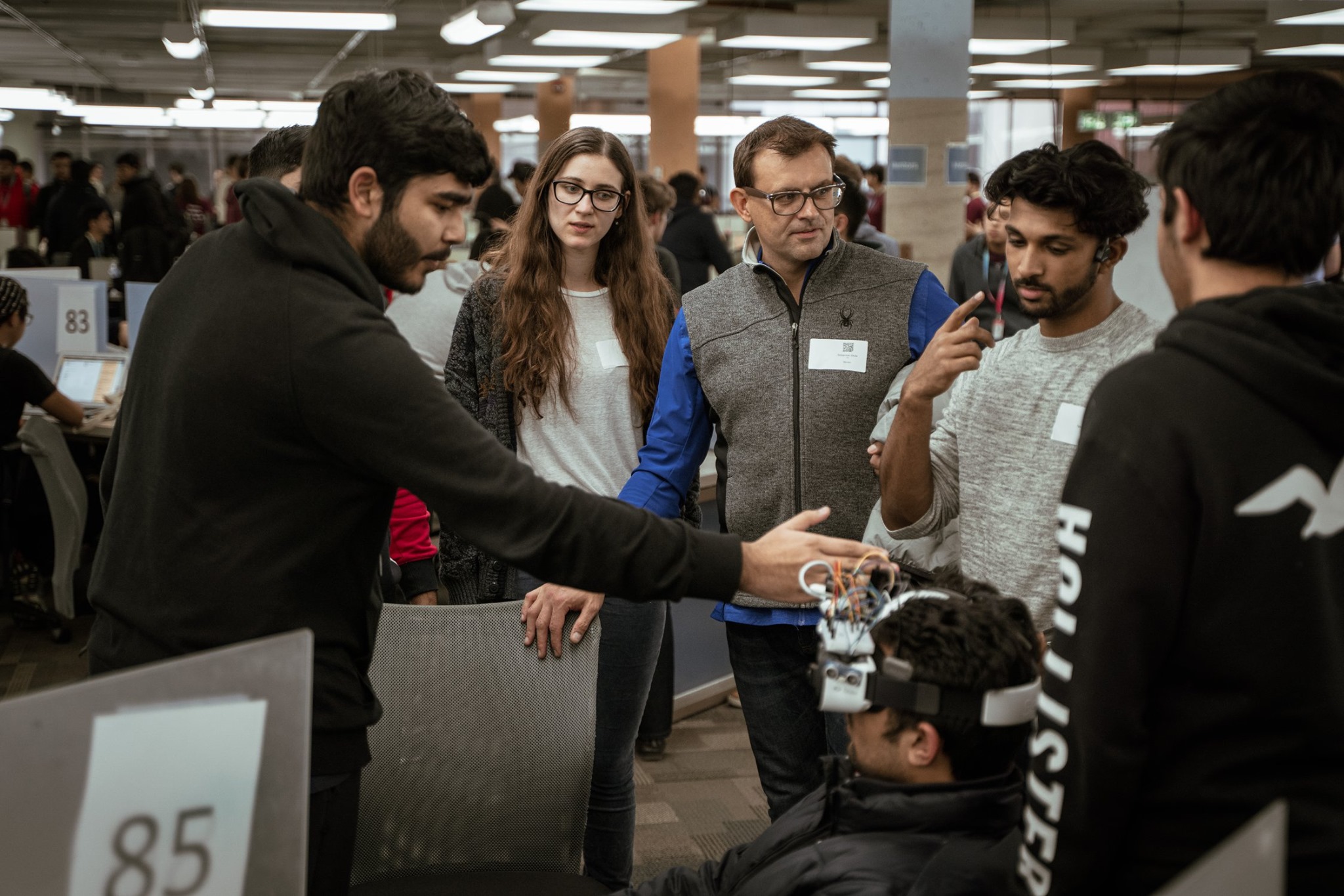 Himanshu Aggarwal showcasing and presenting VisionX in front of the judges at McMaster University's DeltaHacks 6 hackathon.